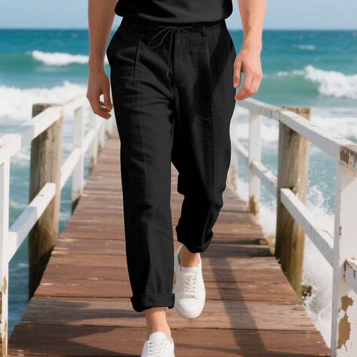 Men's beach-suitable linen blend lounge pants with elastic drawstring, subtle pleat, and rolled ankle hem Mune Fashion