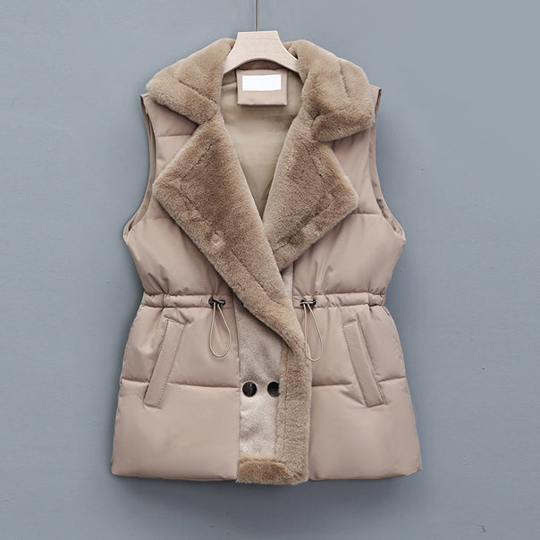 Women's non-quilted vest with faux fur shawl collar, padded insulation, and adjustable drawstring. Mune Fashion