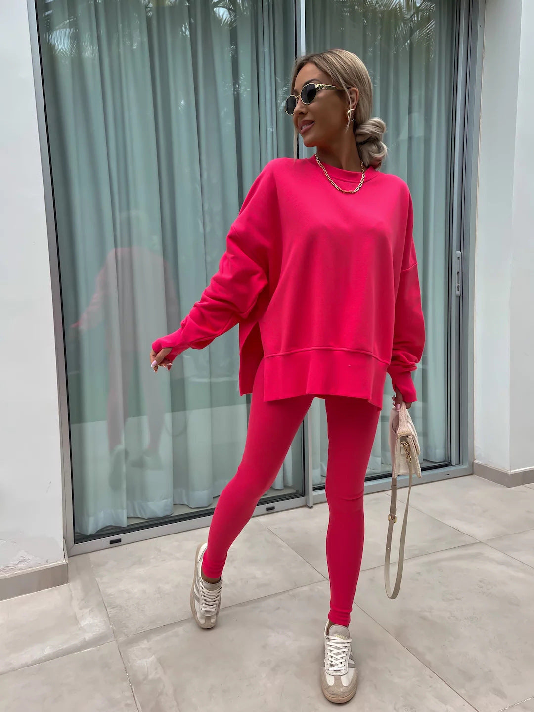 Women comfortable oversized lounge set with long sweatshirt, ribbed high-waist leggings and extended cuffs Mune Fashion