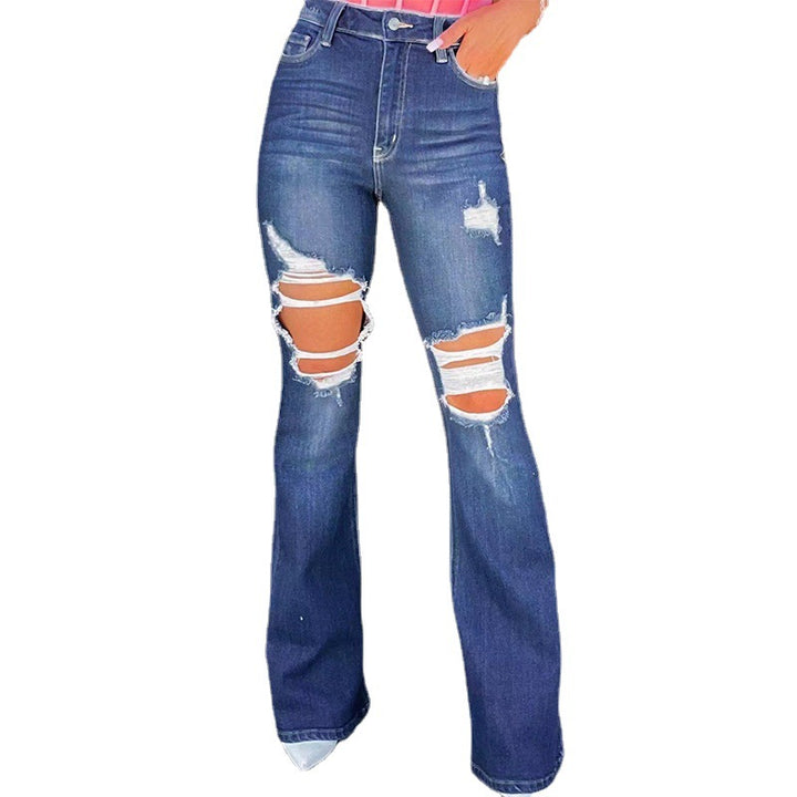 Women's nan high waist jeans with flared leg and heavy distressing at the knees Mune Fashion