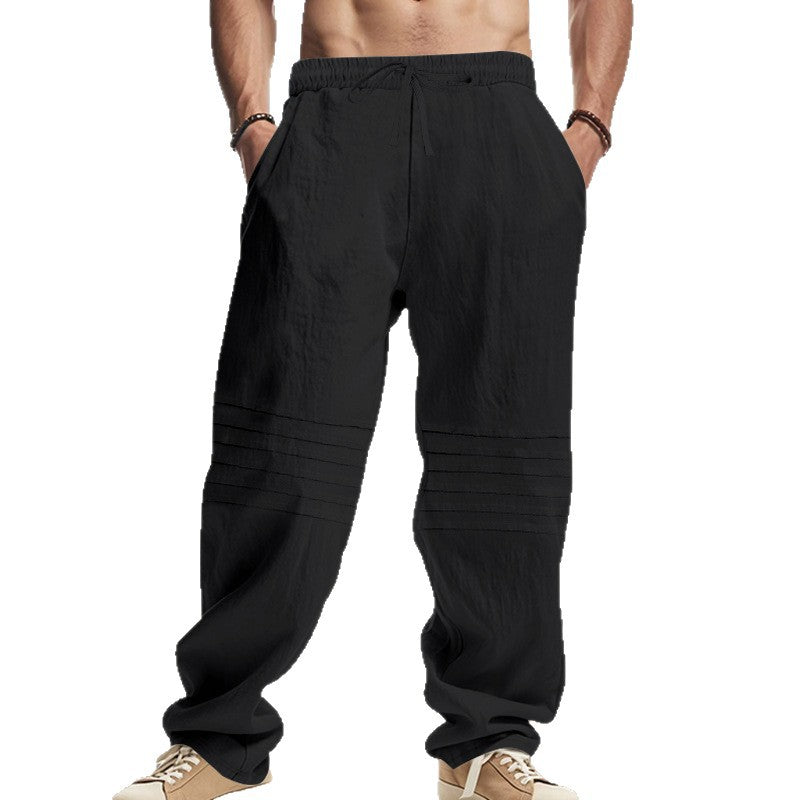 Men's loose linen lounge pants with elastic drawstring waistband, side pockets, and decorative piping Mune Fashion