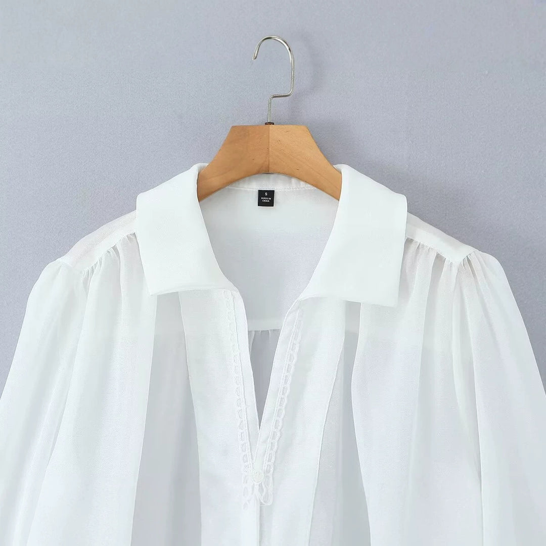 Ladies transparent chiffon blouse with volume sleeves, lace trim and wide cuffs