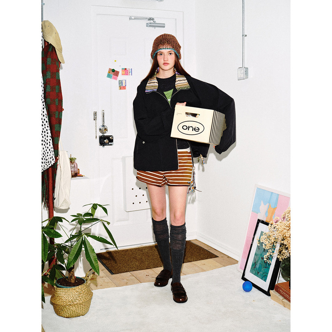 Women's short jacket in boxy cut with patterned stand-up collar and drawstring hood