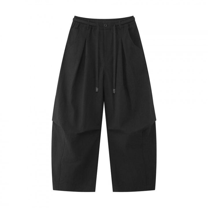 Unisex wide layered pants with balloon-shaped silhouette, high waist and drawstring Mune Fashion