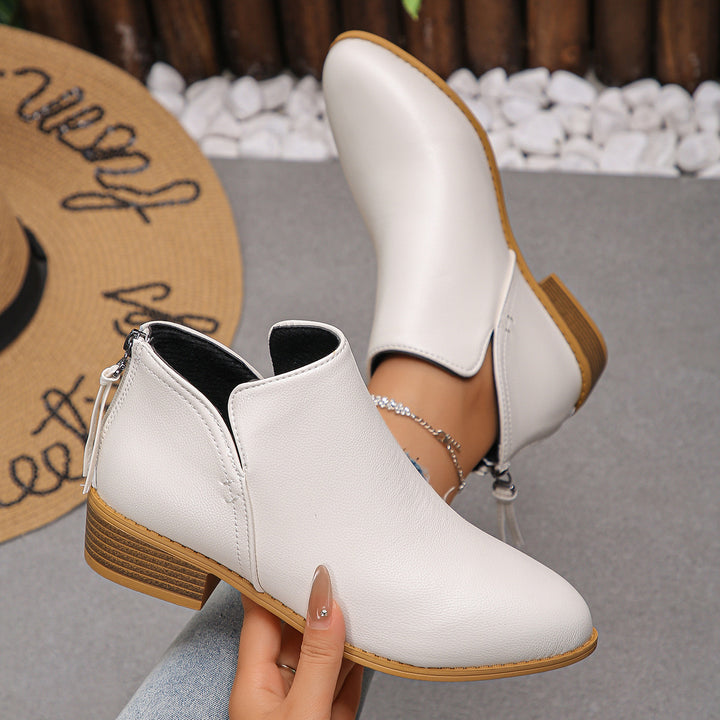 Women's fashionable short ankle boots with rear zipper, low block heel, and padded comfort insole Mune Fashion