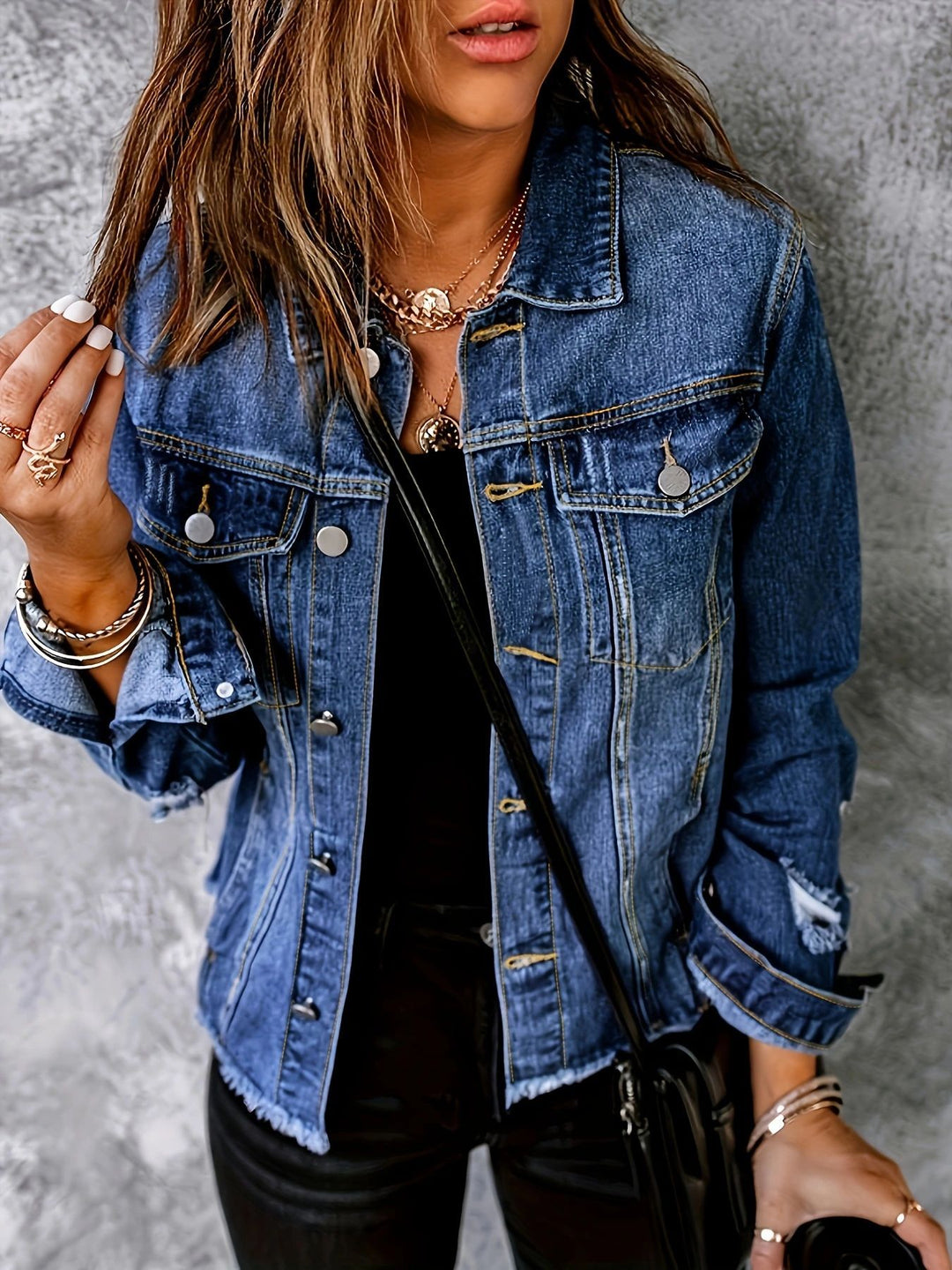 Ladies short cut denim jacket in trucker style with fringe detailing Mune Fashion
