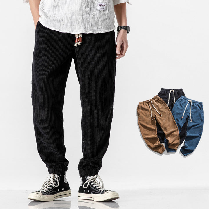 Men's corduroy jogger-style trousers made of corduroy velour with an elastic waistband and ribbed leg hems Mune Fashion