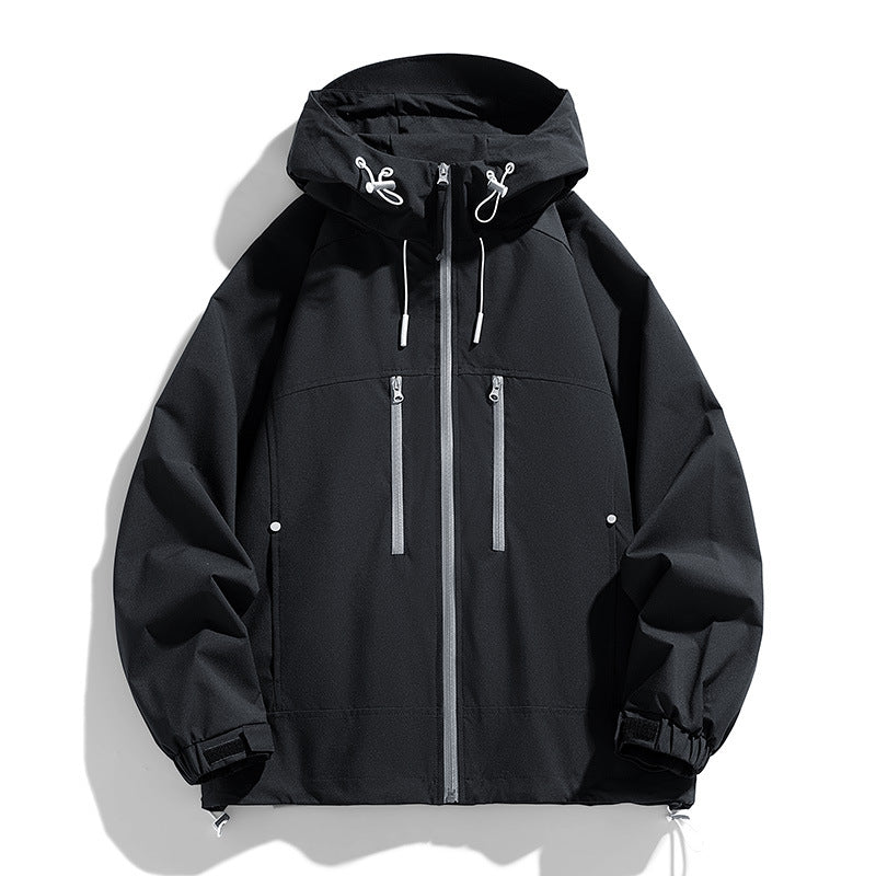 Unisex lightweight water-repellent hoodie jacket with two vertical zip chest pockets and adjustable hem Mune Fashion