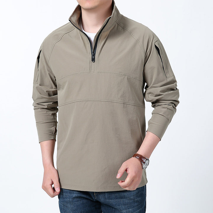 Men's softshell pullover with short zipper, arm pocket, and raglan sleeves Mune Fashion