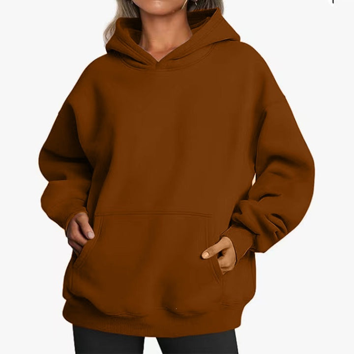 Women's oversized hooded sweatshirt with raglan sleeves, kangaroo pocket and soft fleece lining Mune Fashion