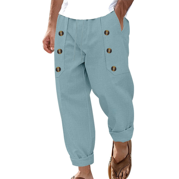 Men's loose linen trousers with decorative button stripes, rolled ankle cuffs, and side pockets Mune Fashion