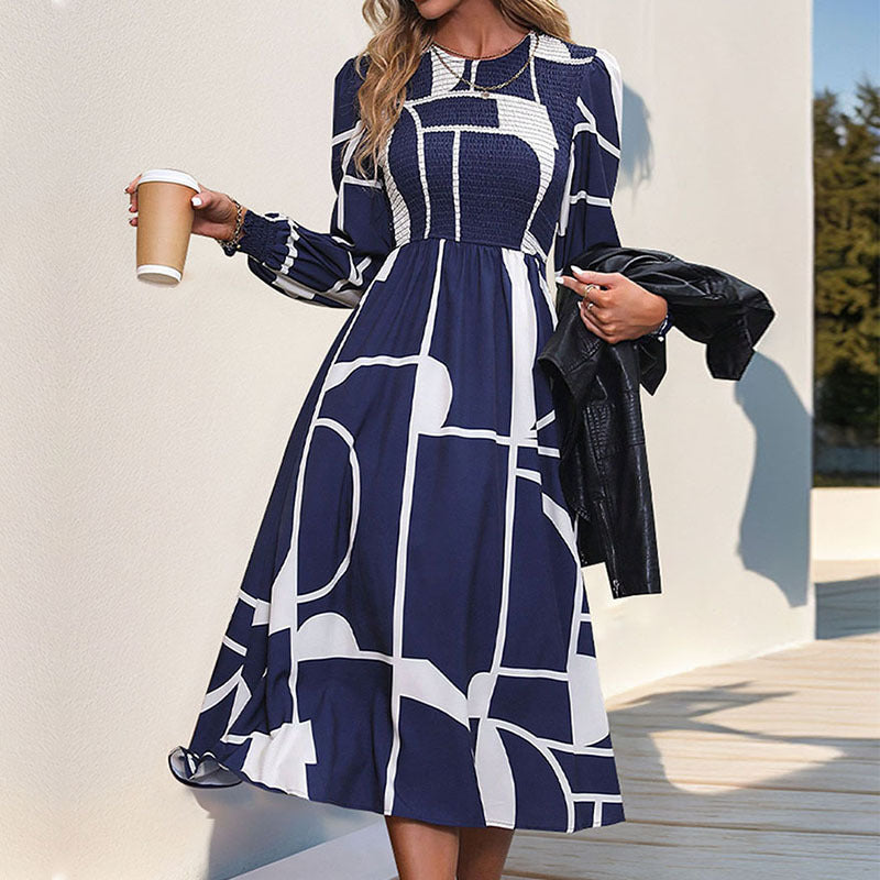 Women's A-line midi dress with smocked bustier, long balloon sleeves, and graphic print Mune Fashion