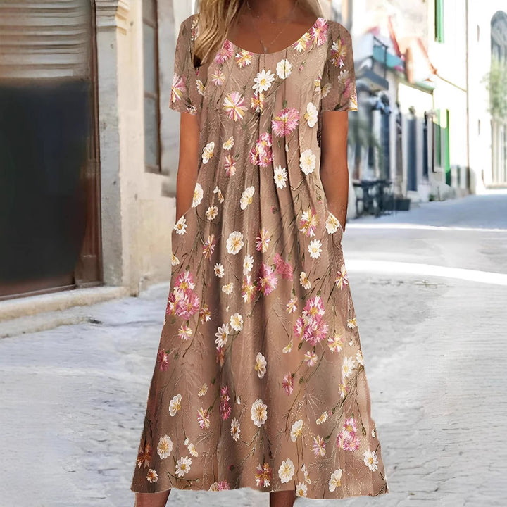 Women's nan Blumenswing midi dress with round neckline, inset pockets, and structured crepe quality Mune Fashion