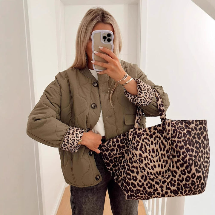Women Padded Quilted Jacket in Boxy Cut with Round Neckline and Applied Pockets Mune Fashion