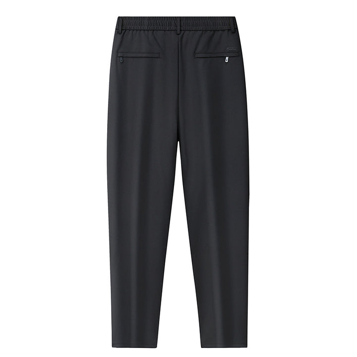 Men's leisure pants with elastic waistband, tapered cut and zippered pockets Mune Fashion