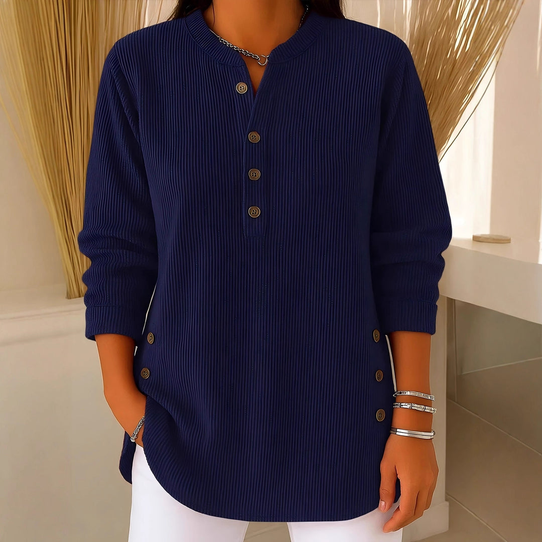 Women's plisse tunic blouse with stand-up collar, button placket and side decorative buttons Mune Fashion
