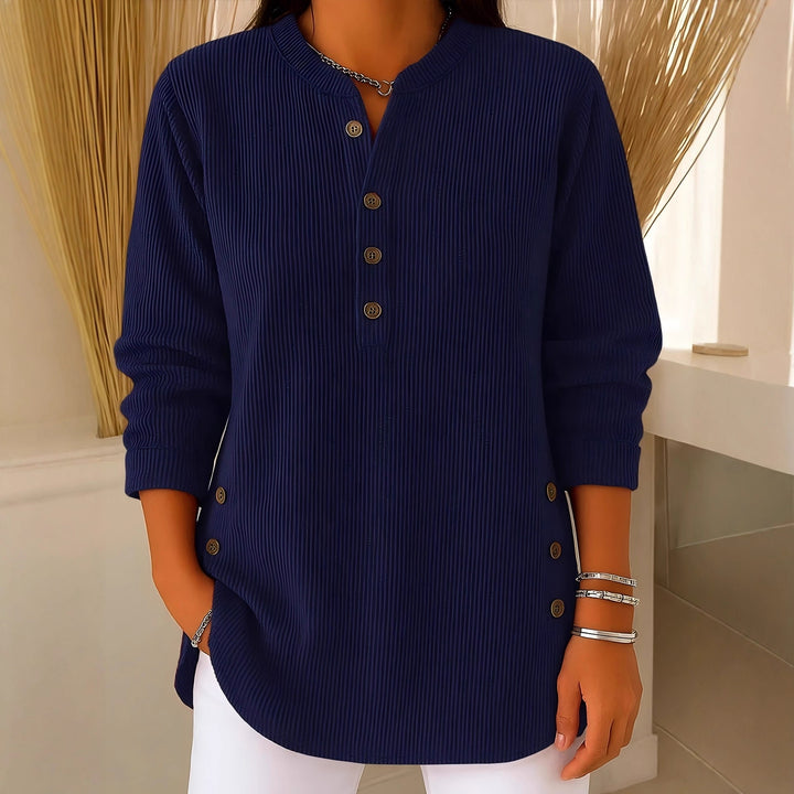 Women's plisse tunic blouse with stand-up collar, button placket and side decorative buttons Mune Fashion