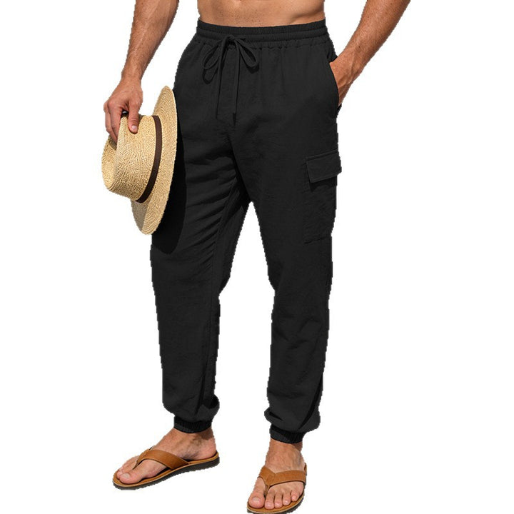 Men's lightweight linen jogging pants with elastic drawstring waistband, cargo side pocket, and ribbed ankle cuffs Mune Fashion