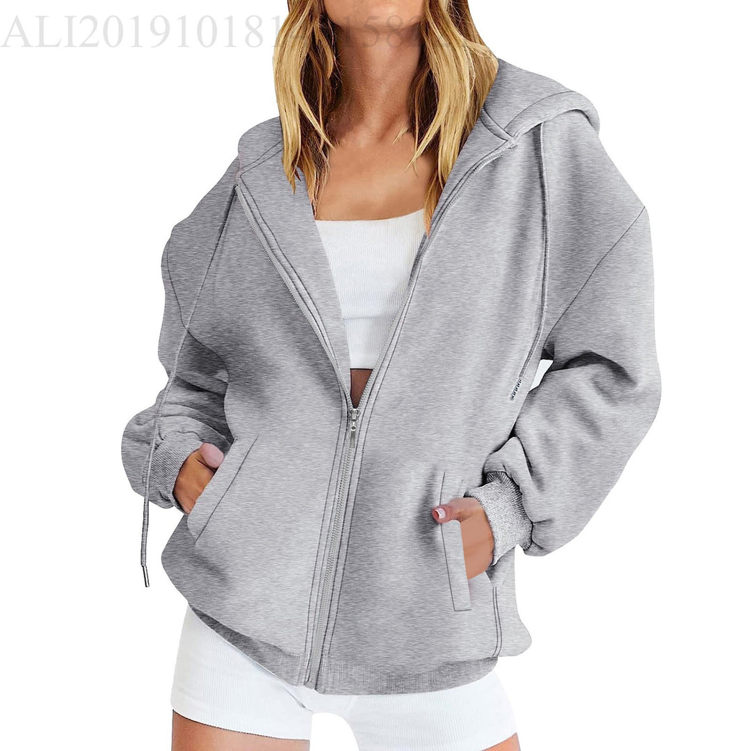 Women's casual zip hoodie jacket in boxy cut with dropped shoulders, hidden drawstring, and large kangaroo pockets Mune Fashion