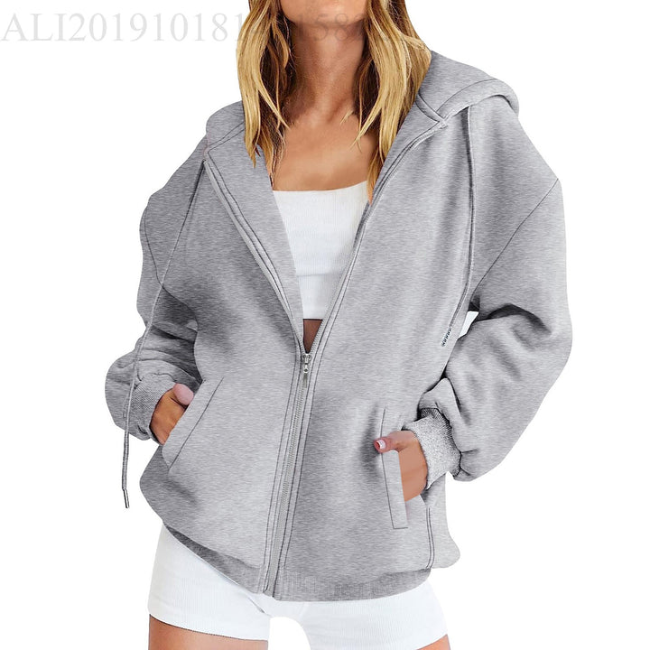 Women's casual zip hoodie jacket in boxy cut with dropped shoulders, hidden drawstring, and large kangaroo pockets Mune Fashion