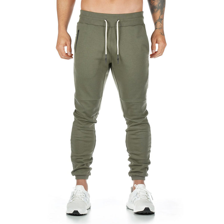 Men's narrow-cut joggers with ribbed waistband, zip pocket, and knee darts Mune Fashion