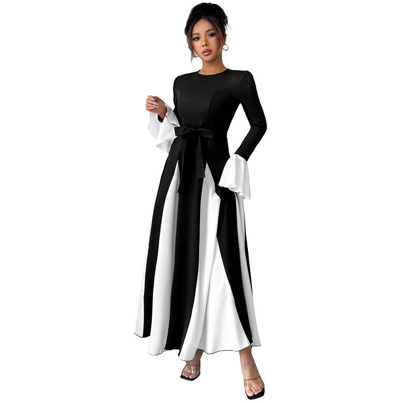 Ladies evening dress with fitted corset top, long sleeves and contrasting flounce cuffs Mune Fashion