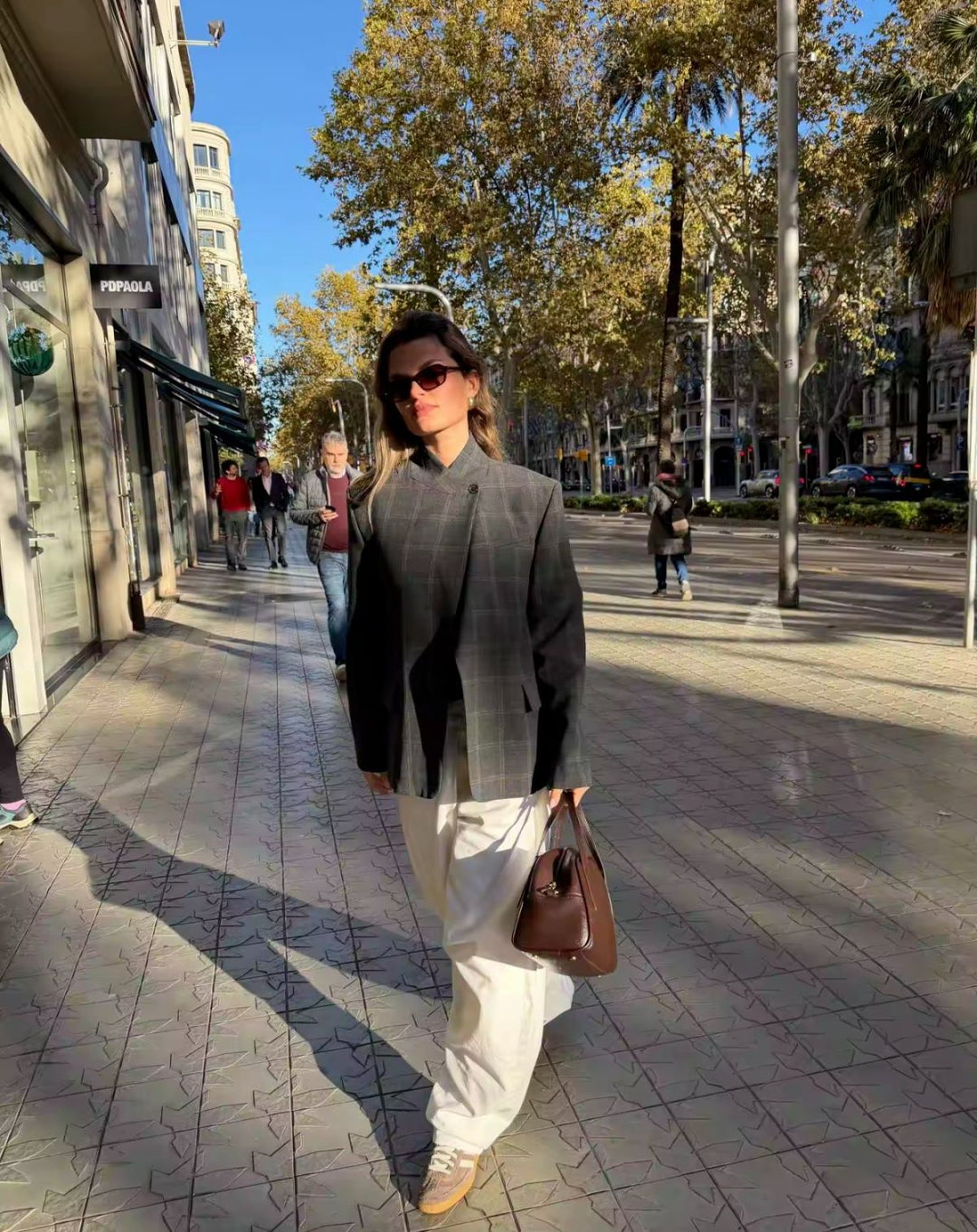 Women's oversized blazer in boxy cut with asymmetrical stand collar and concealed button placket Mune Fashion