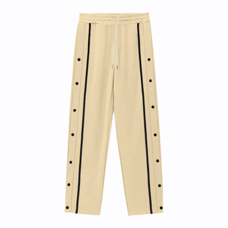 Men's Nan sporty jogging pants with side snap button placket, elastic drawstring waistband, and striking side stripes Mune Fashion