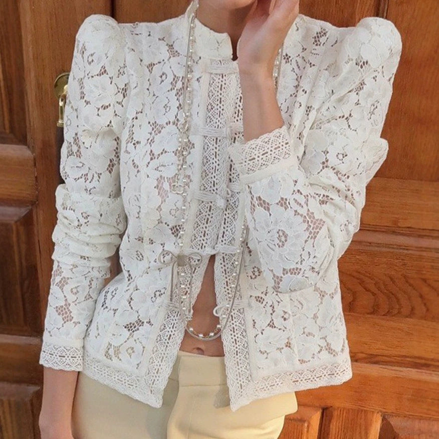 Women's figure-hugging lace blouse with stand collar, decorative knot closure, and crocheted hem Mune Fashion