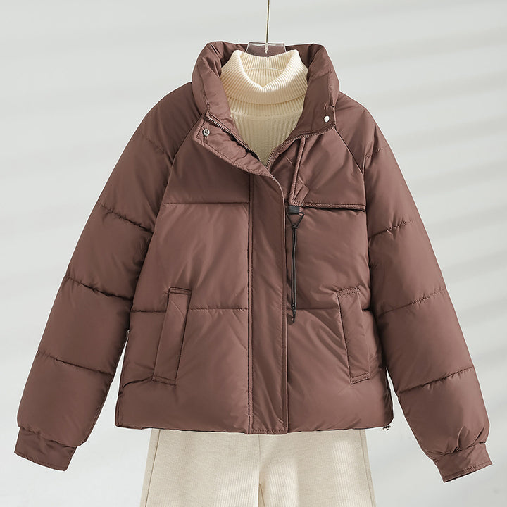 Women's non-short padded boxy jacket with high stand-up collar, drawstring chest closure, and slanted flap pockets Mune Fashion