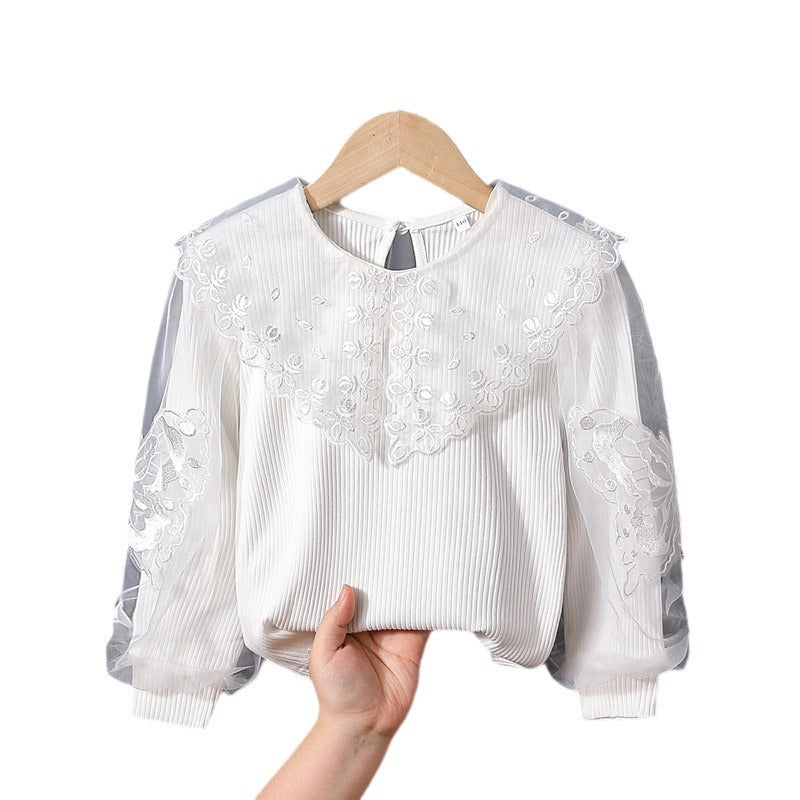 Girl's blouse with transparent puff sleeves and floral lace trim Mune Fashion