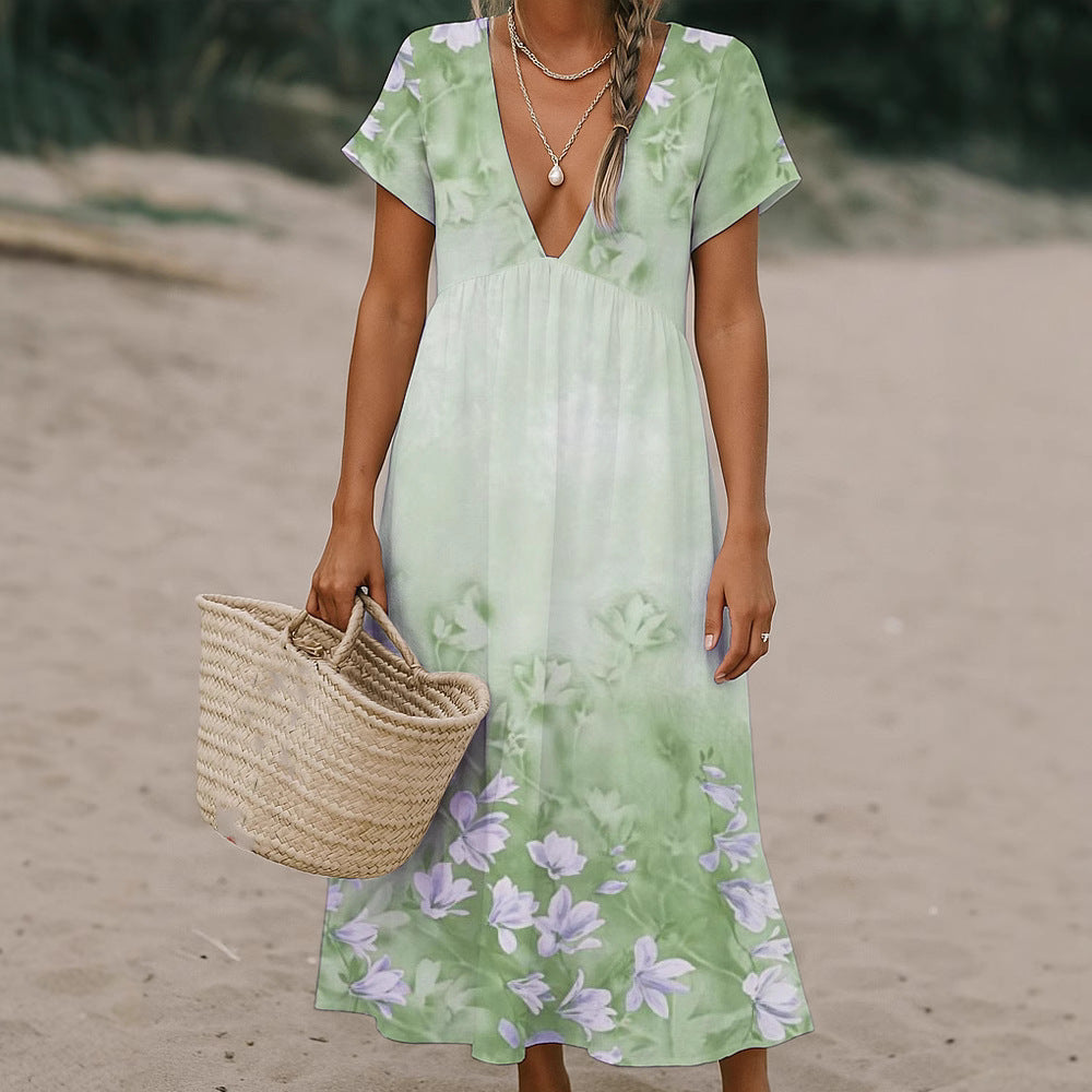 Ladies max dress with deep V-neck and flowing skirt Mune Fashion