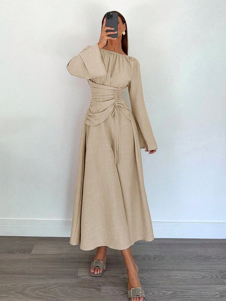 Women's maxi dress with gathered waist lacing, wide sleeves, and flowing skirt Mune Fashion