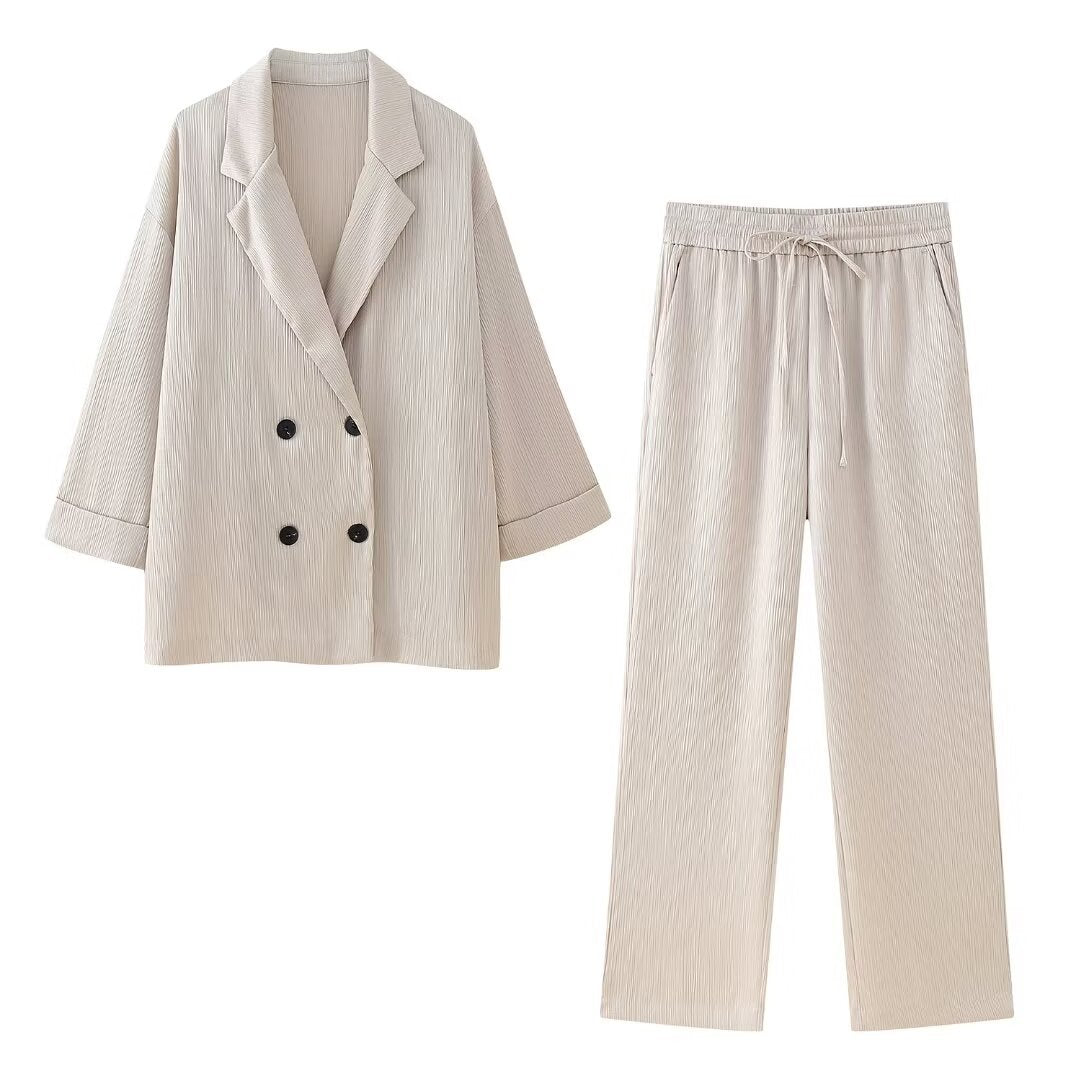 Women's wide pleated pants with elastic waistband, drawstring and side pockets Mune Fashion