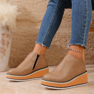 Women's Mune Fashion ankle boot with wedge heel, side zipper, and padded comfort insole