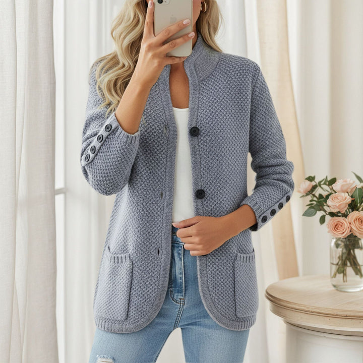Women's structured oversized cardigan with decorative sleeve button placket and patch pocket Mune Fashion