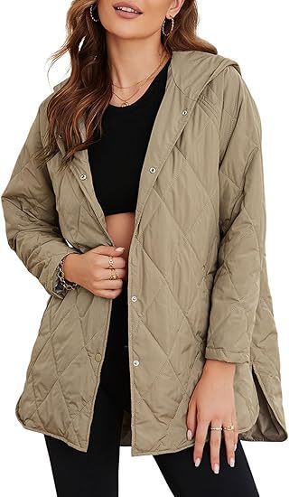 Women's quilted hooded jacket with snap button placket, side slits, and medium length Mune Fashion