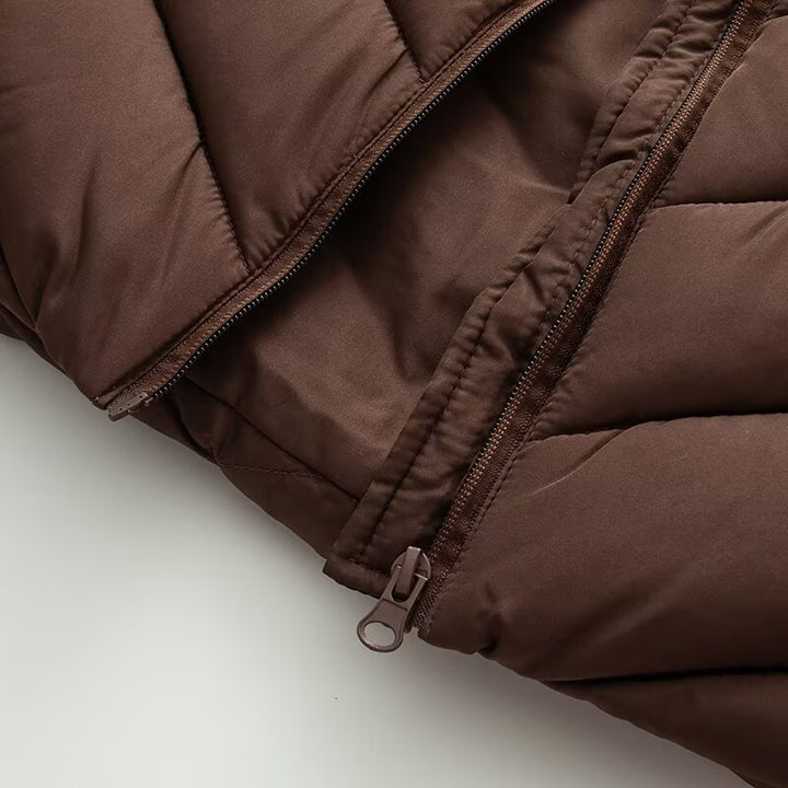 Women's hybrid quilted jacket with padding, hood, and elastic sleeve inserts Mune Fashion