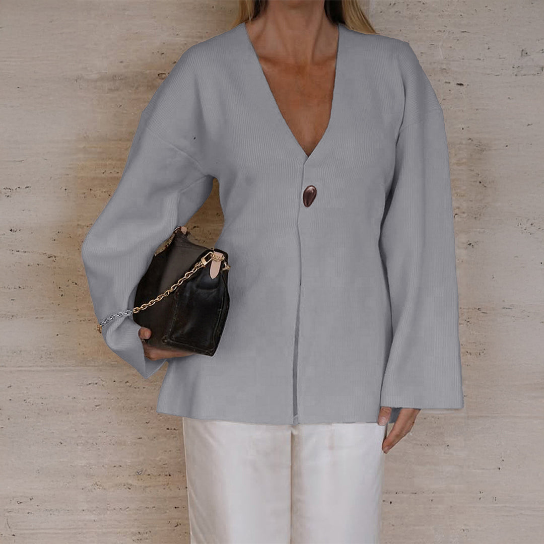 Women's fitted fine knit cardigan with V-neck, decorative button, and front slit Mune Fashion