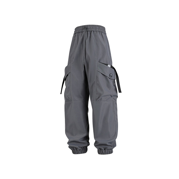 Unisex Wide Technical CargoJogging Pants with adjustable drawstring, large flap pockets, and elastic ankle cuffs Drune