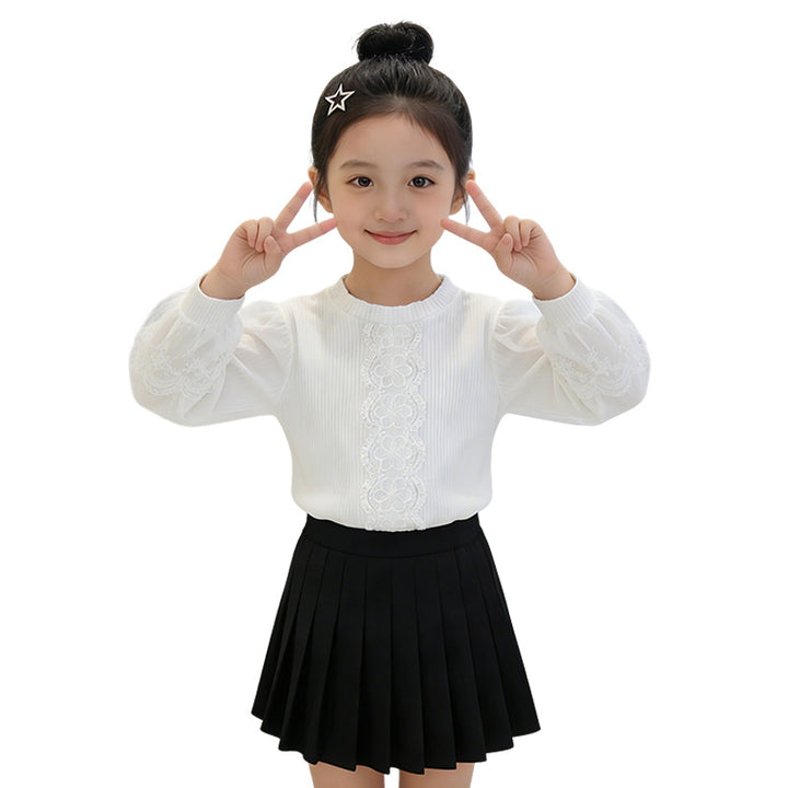 Girls elegant blouse with transparent puff sleeves and delicate floral embroidery Mune Fashion