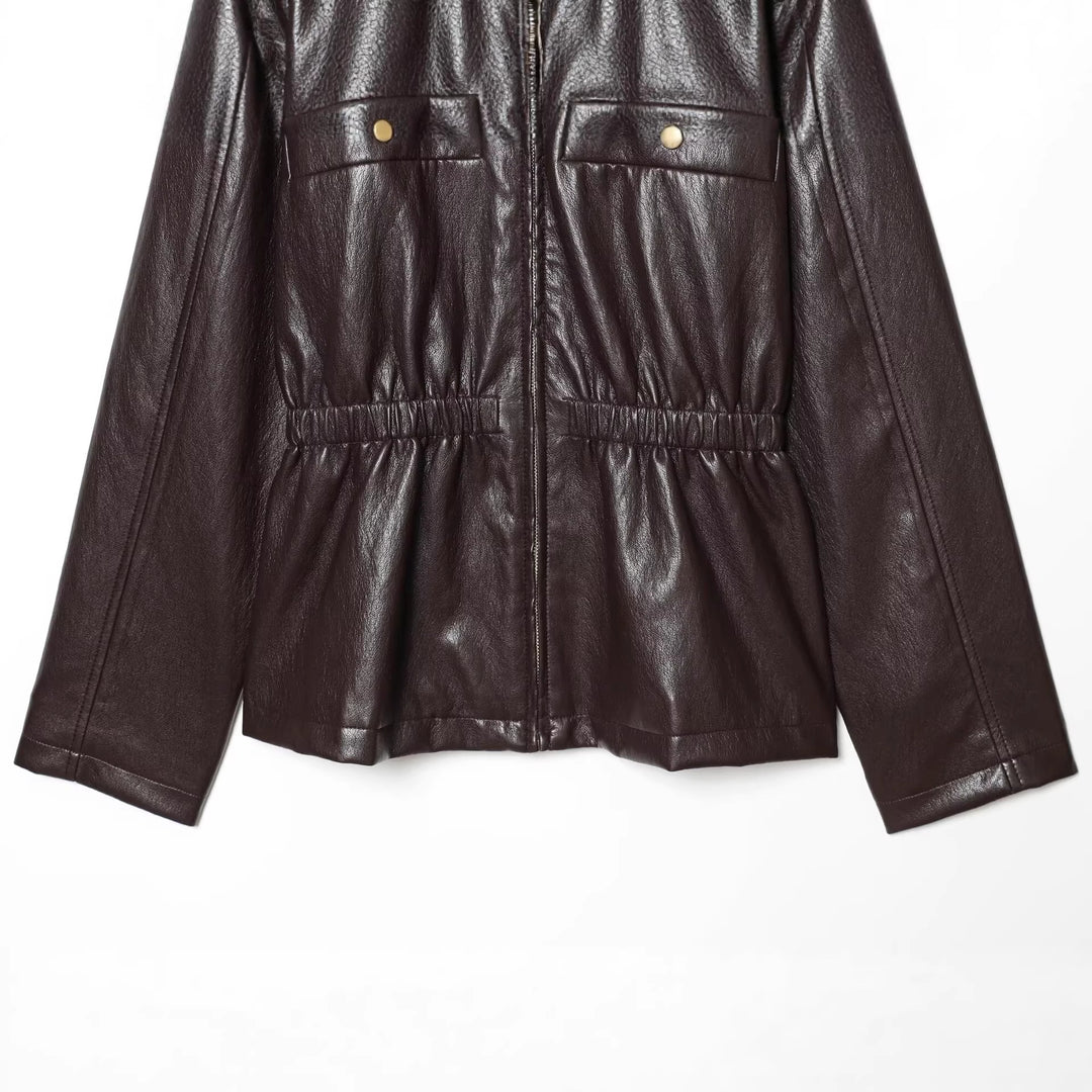 Women's short jacket in vegan leather look with cinching drawstring and flap pockets Mune Fashion