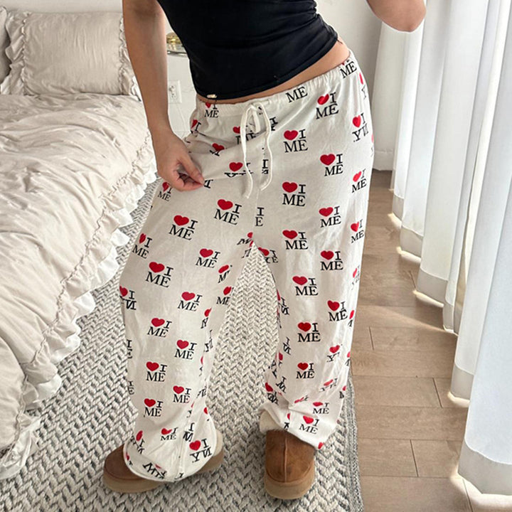 Ladies wide pleated trousers with zebra pattern, elastic drawstring and flowing jersey feel Mune Fashion
