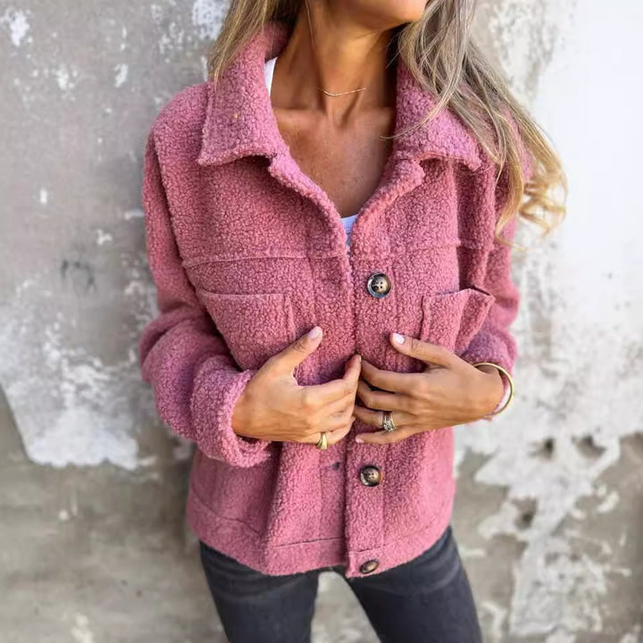 Ladies teddy jacket with large lapel collar, continuous button placket, and patch pockets Mune Fashion