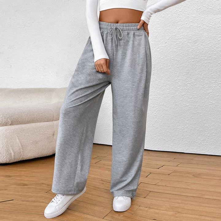 Women's wide sweatpants with elastic waistband, drawstring and adjustable hem.