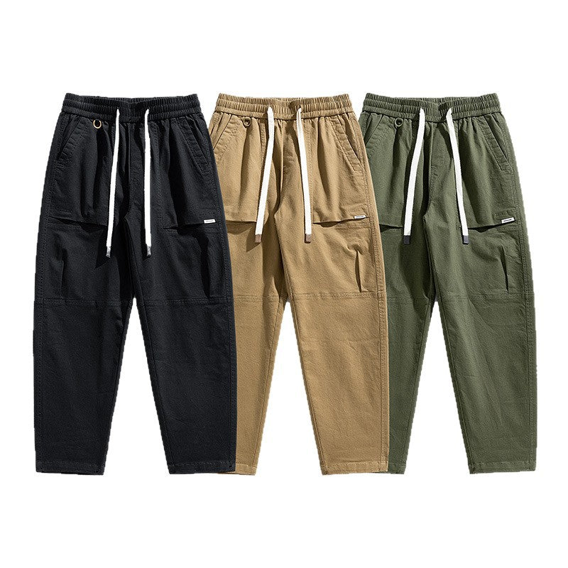 Herren Baggy-Utility-Cargohose im Tapered-Schnitt mit elastischem Tunnelzugbund, aufgesetzten Fronttaschen und Knieabnähern Mune Fashion