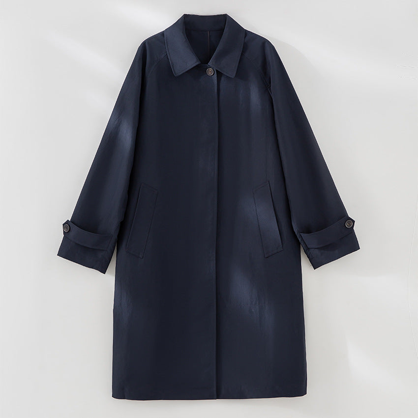 Women Longer minimalist trench coat with concealed button placket and adjustable cuffs Mune Fashion