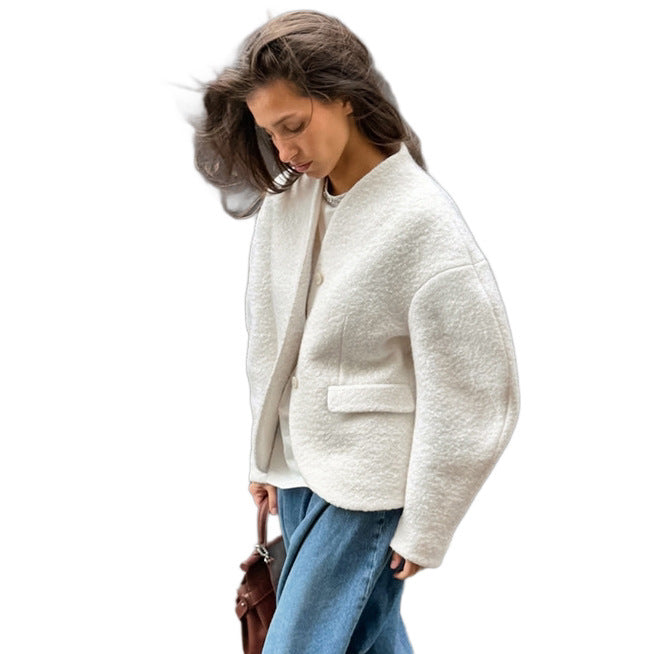 Ladies short jacket in boucle style with oversized sleeves and flap pockets Mune Fashion