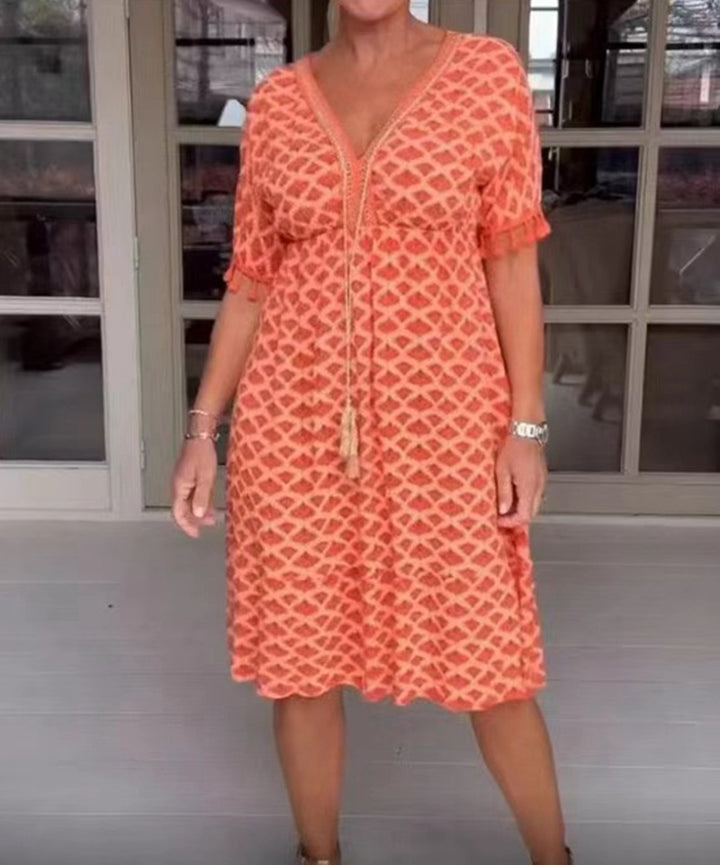 Women's casual V-neck beach dress with tassel tie and ruffle skirt Mune Fashion