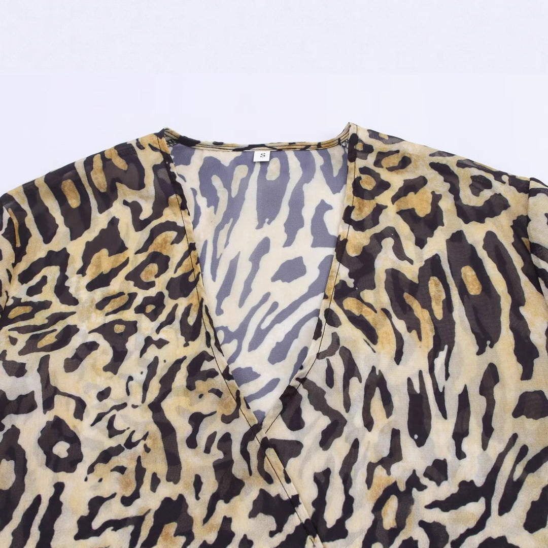 Ladies Asymmetric Wrap Blouse with Leopard Print, V-Neck, Balloon Sleeves, and Waistbelt Mune Fashion